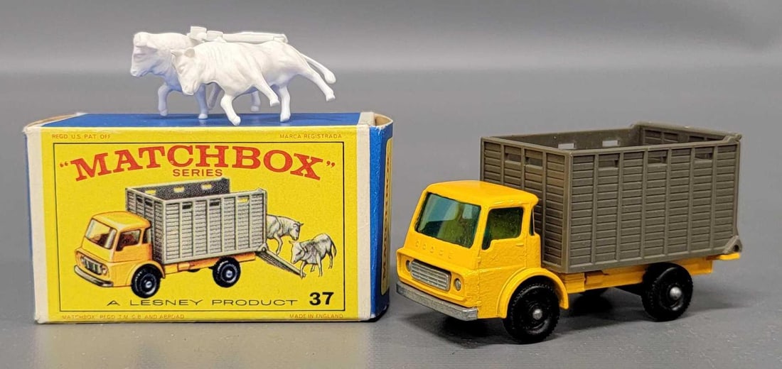 Matchbox 37 Cattle Truck in original box: Matchbox 37 Dodge Cattle Truck with cattle figures on sprue, black plastic wheels, in near mint to mint condition in a very good E4 original box as seen in the photos.