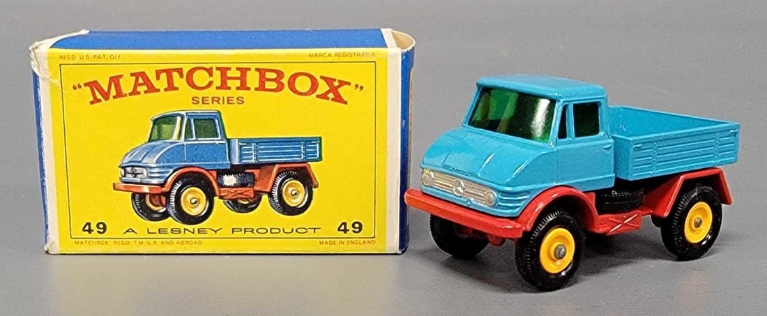 Matchbox 49 Unimog in original box: Matchbox 49 Unimog with red base, blue body, in near mint to mint condition in a very good E4 original box as seen in the photos.