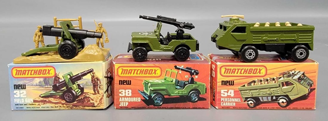 Three Matchbox Military cars in original boxes: Three Matchbox Military cars in original boxes. Consists of No 32 Field Gun with two soldiers and missiles on base, No 38 Superfast Armoured Jeep with black five arch wheels, No 54 Superfast Personnel