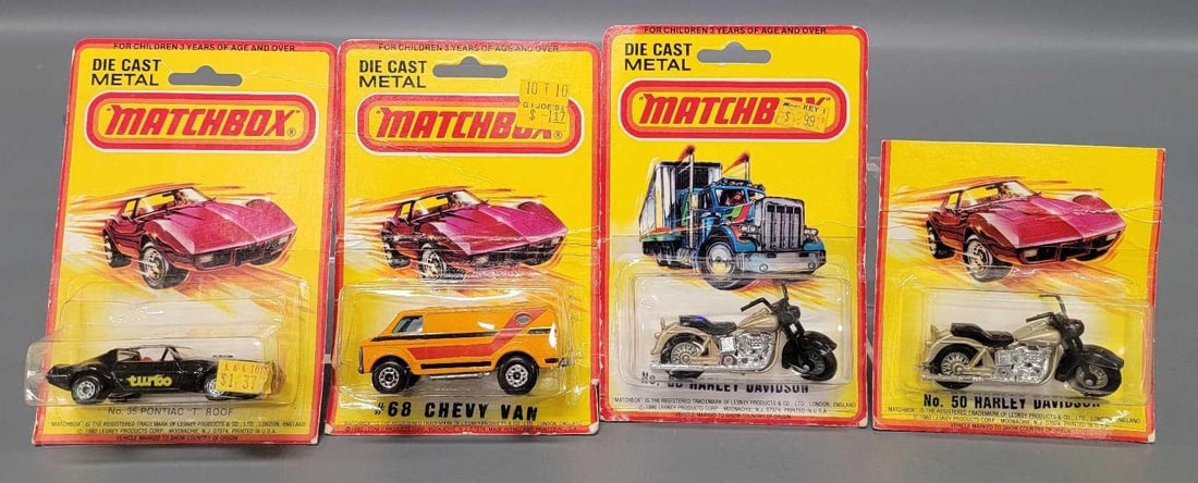 Four Matchbox cars in blister packs (1 of 6)