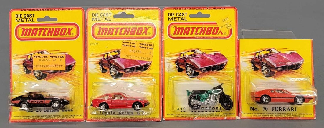 Four Matchbox Superfast cars in blister packs: Four Matchbox Superfast cars in blister packs. Consists of No 18 Green Hondorora motorcycle, No 70 Ferrari with a cut blister pack, Toyota Celica GT with model number, creased blister, No 24 Datsun 28