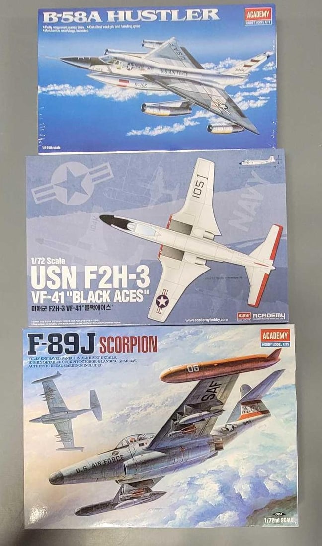Group of Academy 1/72 and 1/144 Fighter Jets in original boxes: Group of three Academy 1/72 and 1/144 scale Fighter Jets. Consists of F-89J Scorpion stock number 1628 in an open box with all parts inventoried and accounted for, factory sealed B-58A Hustler 1/44 sc