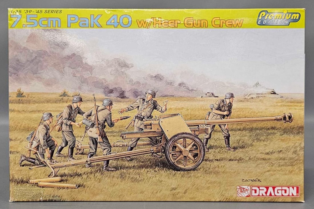 Dragon 1/35 7.5cm Pak 40 with Heer Gun Crew in original box kit 6433: Dragon 1/35 scale 1939-1945 7.5cm Pak 40 with Heer Gun Crew stock number 6433 in an open box with all parts inventoried and accounted for in a very good original box as seen in the photos.