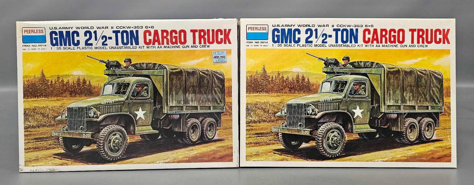 Group of Peerless 1/35 GMC 2 1/2 Ton Cargo Trucks in original boxes: Group of two Peerless 1/35 scale GMC 2 1/2 Ton Cargo Truck kits, one is factory sealed original box, the other is in an excellent open original box with all parts inventoried and accounted for as seen