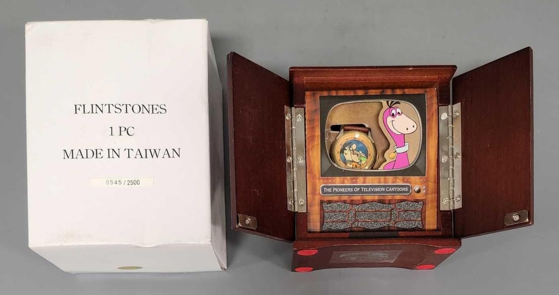 Fossil Flintstones watch in a TV Cabinet: Fossil Flintstones watch in a TV cabinet in excellent condition as seen in the photos.