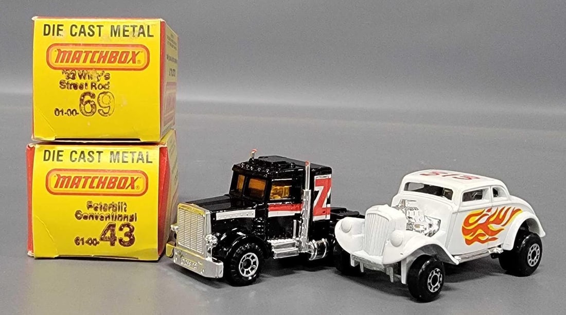 Two Matchbox No 43 Peterbilt and No 69 1933 Willys in original boxes: Two Matchbox No 43 Peterbilt Conventional with 8 spoke concave wheels and a No 69 1933 Willys Street Rod with 5 crown wheels in excellent to near mint condition in good modern original boxes as seen i
