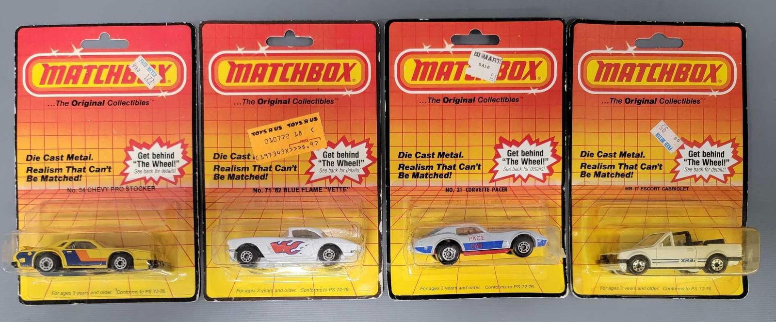 Four Matchbox Chevy and Ford cars in blister packs (1 of 6)