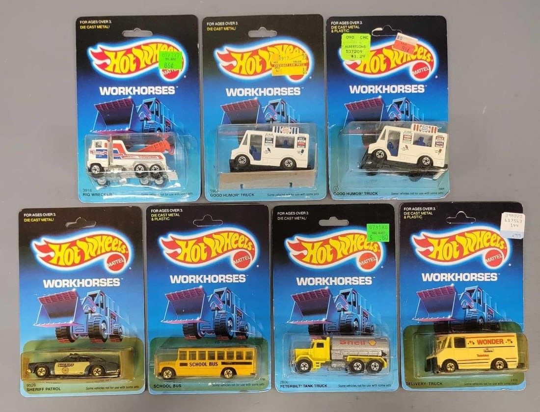 Seven Hot Wheels Workhorses Bus, Delivery Trucks, Police and Towing in blister packs (1 of 4)