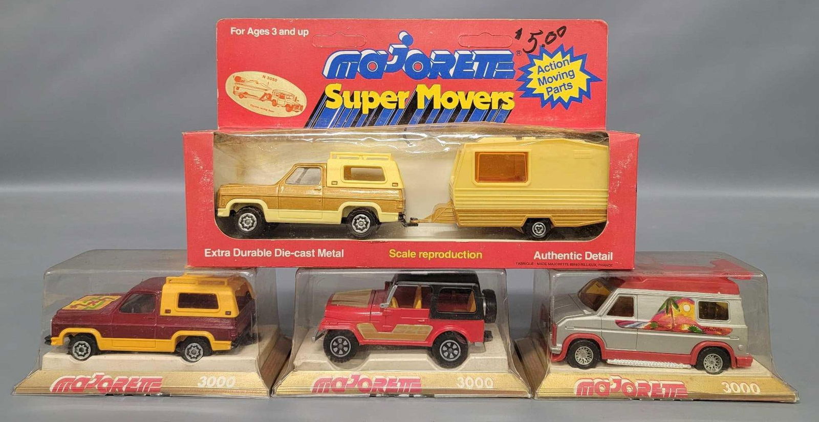 Four Majorette 3000 and Super Movers vehicles in window boxes (1 of 9)