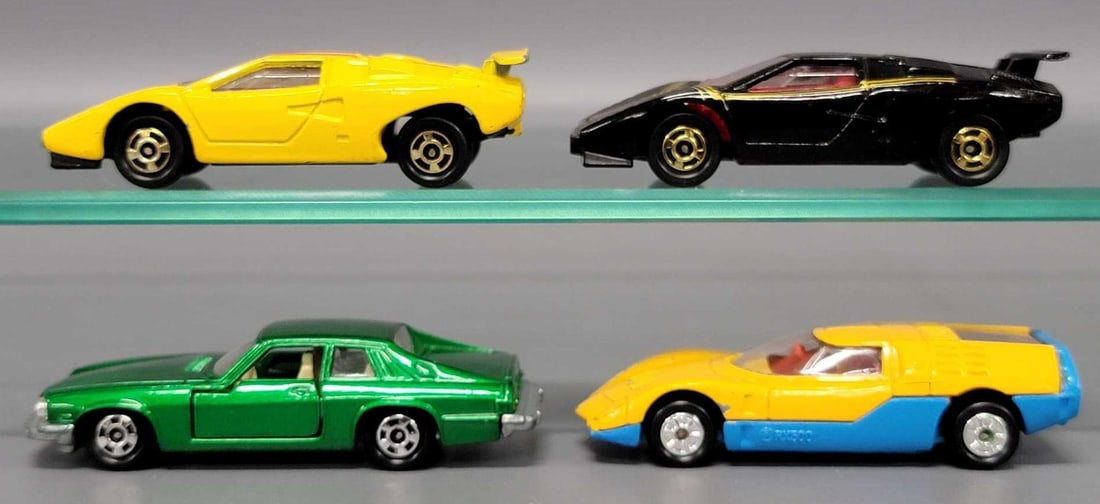 Four Tomica Lamborghini, Jaguar and Mazda cars (1 of 6)