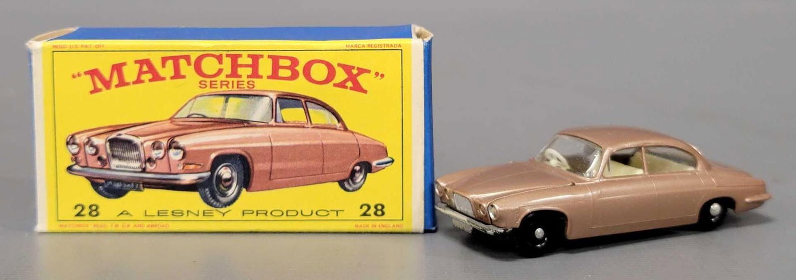 Matchbox No 28 Mark Ten Jaguar in original box: Matchbox No 28 Mark Ten Jaguar in near mint to mint condition in a very good to excellent E3 original box as seen in the photos.
