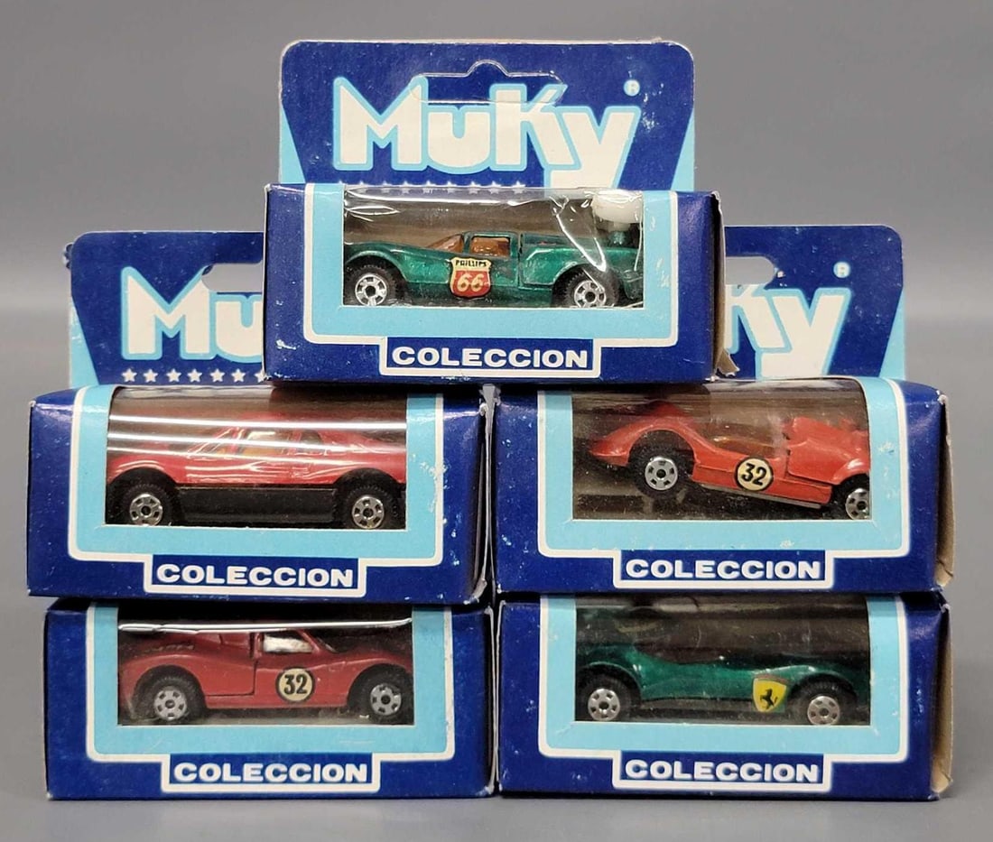 Five Muky cars in original boxes: Five Muky cars in original boxes includes no. 8 Lola GT, no. 18 Ford MK IV, no. 22 Lamborgini, no. 28 Chaparral and no. 39 Ferrari 308 cars are in near mint to mint condition with a excellent original