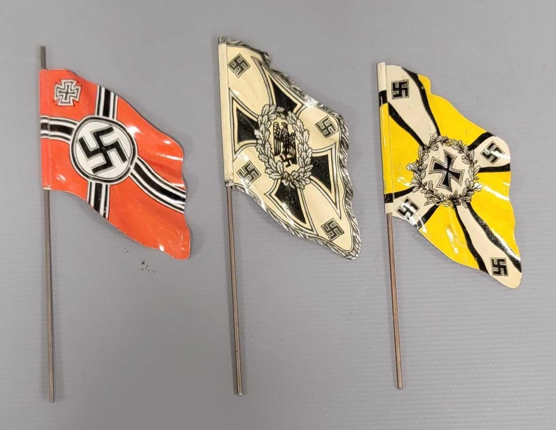 Three WWII German tin toy solier flags: Three WWII German tin toy soldier flags in excellent condition as seen in the photos.