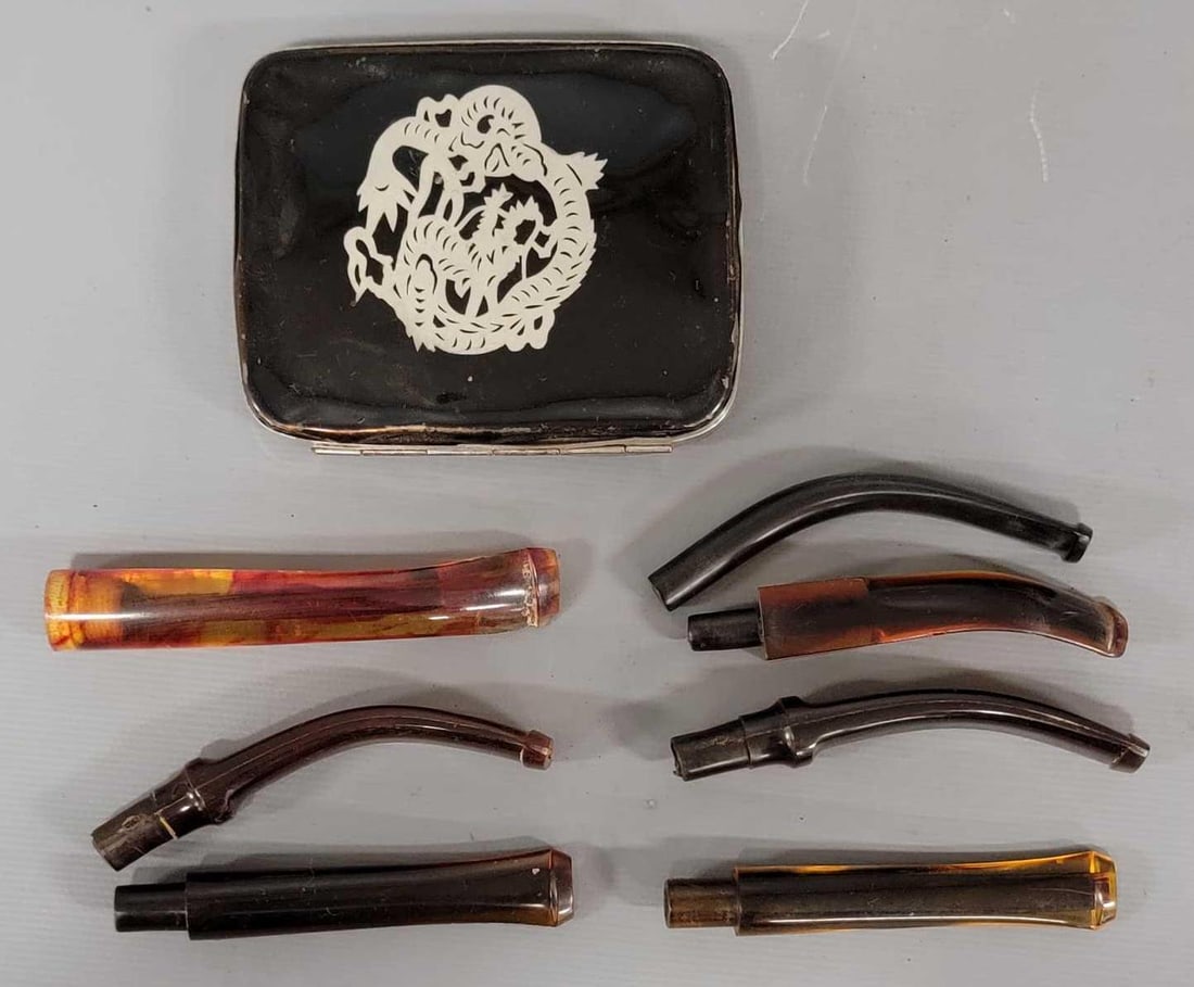 8 vintage items Cigarette Case and Pipe Stems: 8 vintage items Cigarette Case and seven Pipe Stems as seen in the photos.