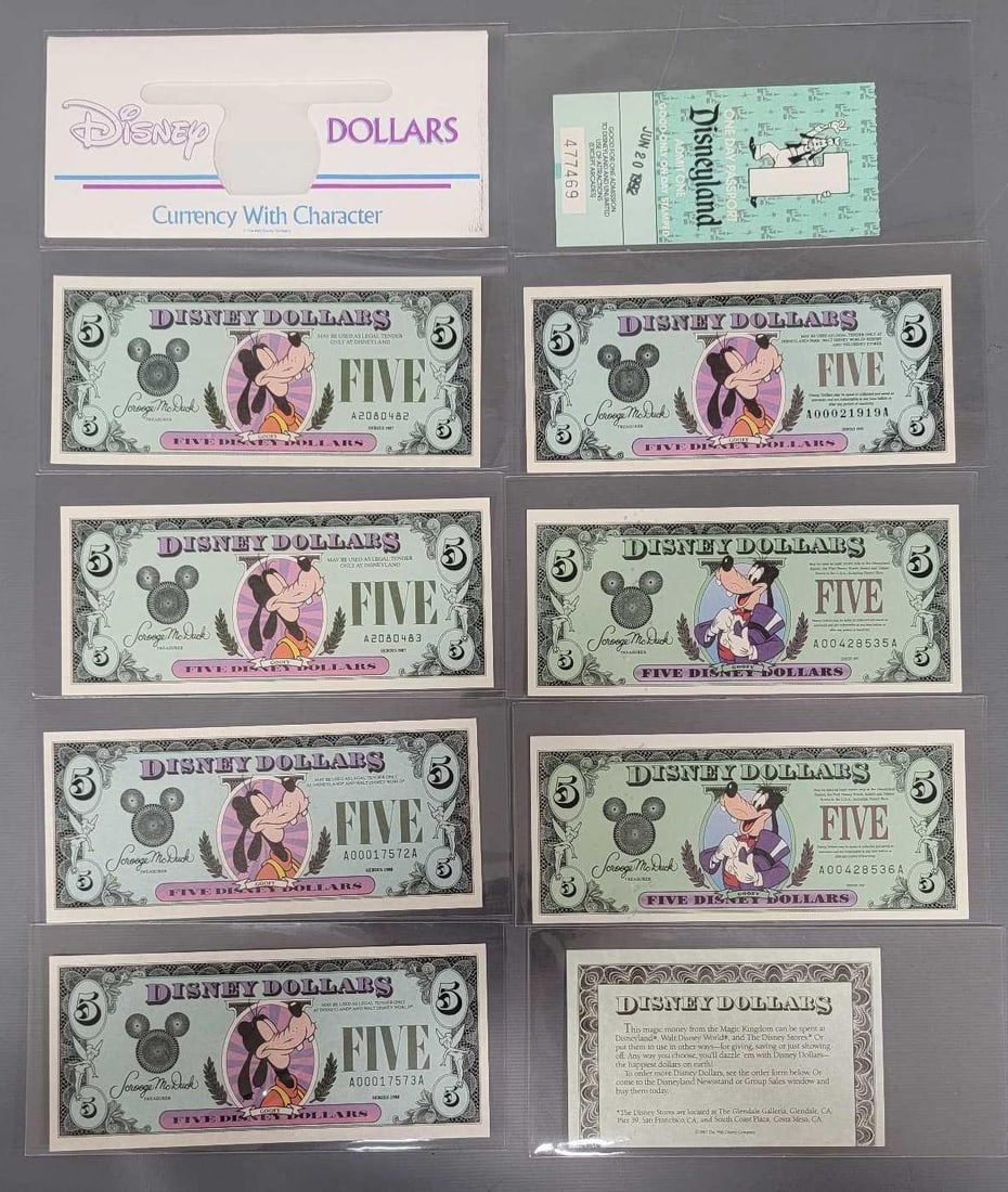 10 Disney Items, Disney Dollars, Disneyland ticket: 10 Disney Items, Disney Dollars, Disneyland ticket. Consists of two 1987 $5 Goofy bills, two 1988 $5 Goofy bills, one 1990 $5 Goofy bill, two 1997 $5 Goofy bills, Disney Dollars order card, Disneyland
