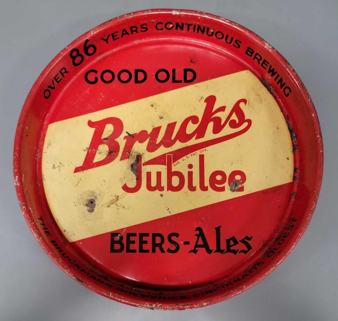 1940's Brucks Jubilee Beers Ale metal serving tray: 1940's Good Old Brucks Jubilee Beers Ale metal Serving Tray Over 86 Years Continuous Brewing with yellow banner in good to very good condition as seen in the photos.