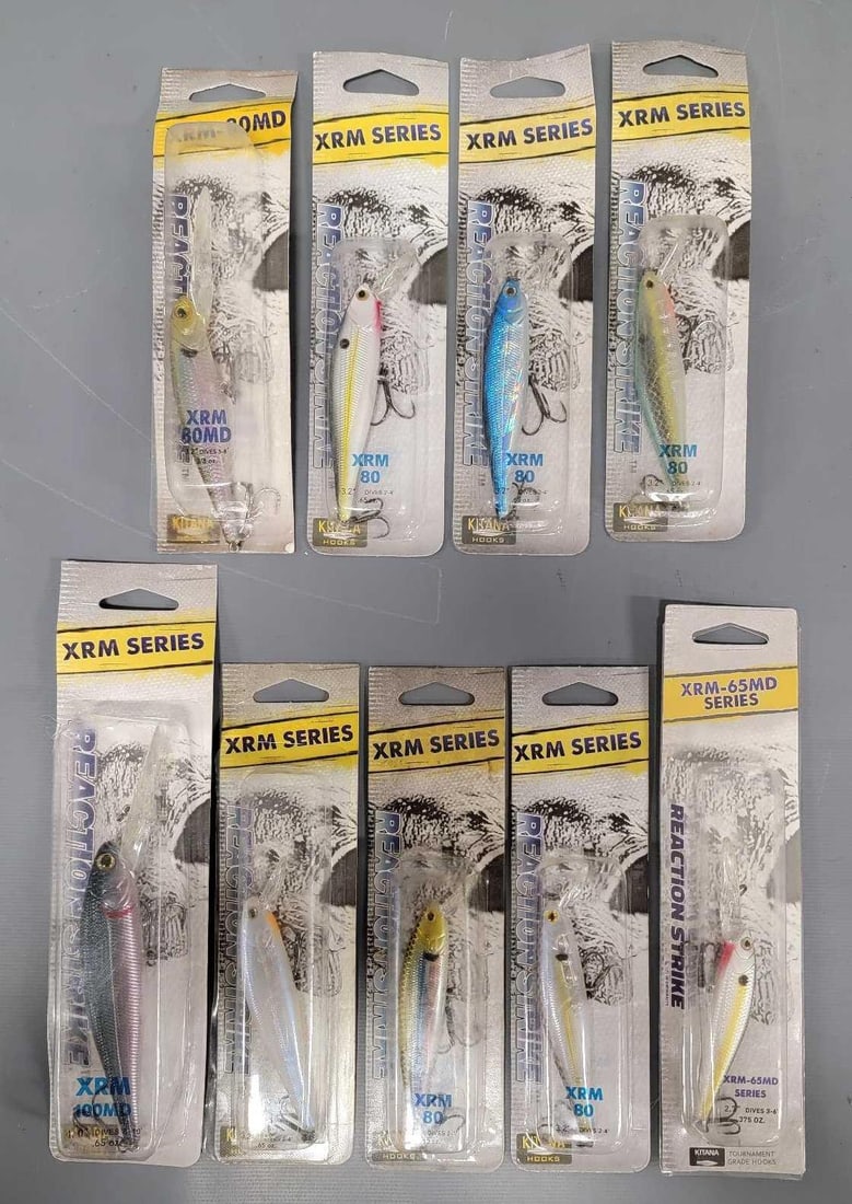 Nine Reaction Strike crank bait lures in blister packs: Nine Reaction Strike crank bait lures in excellent blister packs as seen in the photos.