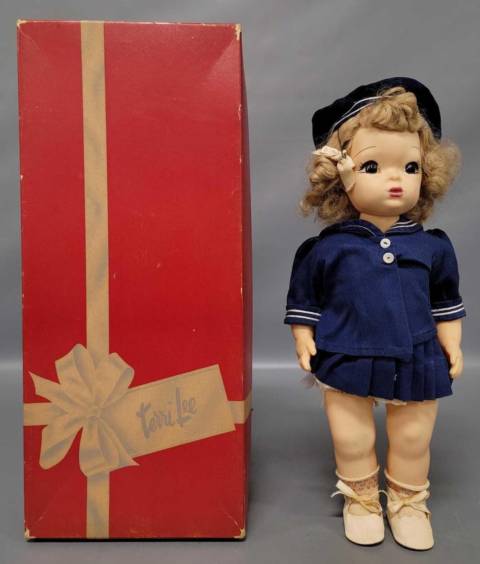 16 inch vintage blonde Terri in Undies doll in original box: 16 inch vintage blonde Terri in Undies doll in excellent condition wearing a tagged sailor suit, undies, socks, and shoes. Her undies, socks, and shoes have stains and her right leg has black marks on