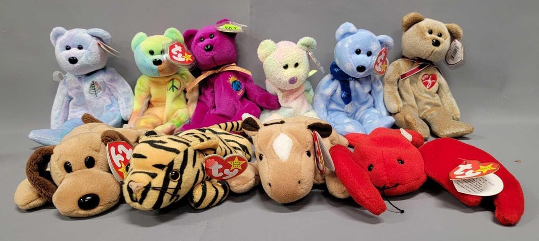Group of ten Ty Beanie Babies: This group of Beanie Babies is from an adult owned collection, all bought new when they were offered back in the mid 1990's, never played with and from a smoke and pet-free home. Group includes 19