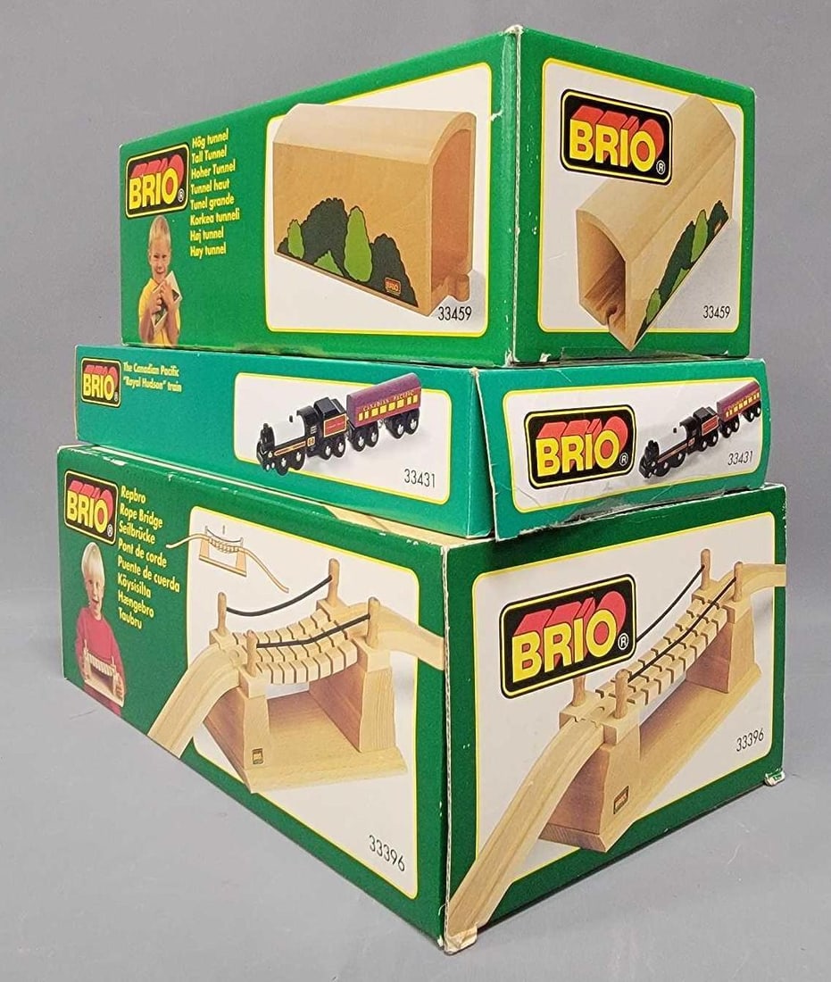 Brio Royal Hudson train with rope bridge and tall tunnel in original boxes: The Canadian Pacific Royal Hudson train no 33431 and Rope Bridge no 33396 does not appear to ever been played with and come in excellent condition boxes. Tall tunnel no 33459 comes in an excellent fac