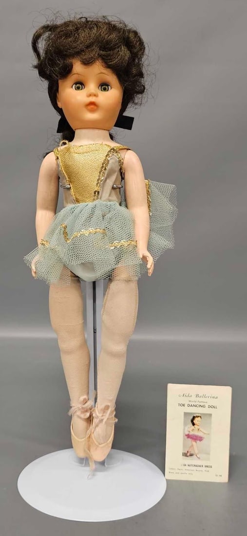 Vintage Aida Ballerina world famous toe dancing doll: Vintage Aida Ballerina world famous toe dancing doll is in very good condition with wear to the front of her outfit and the back straps and clasps and discoloration on the arms as seen in the photos.