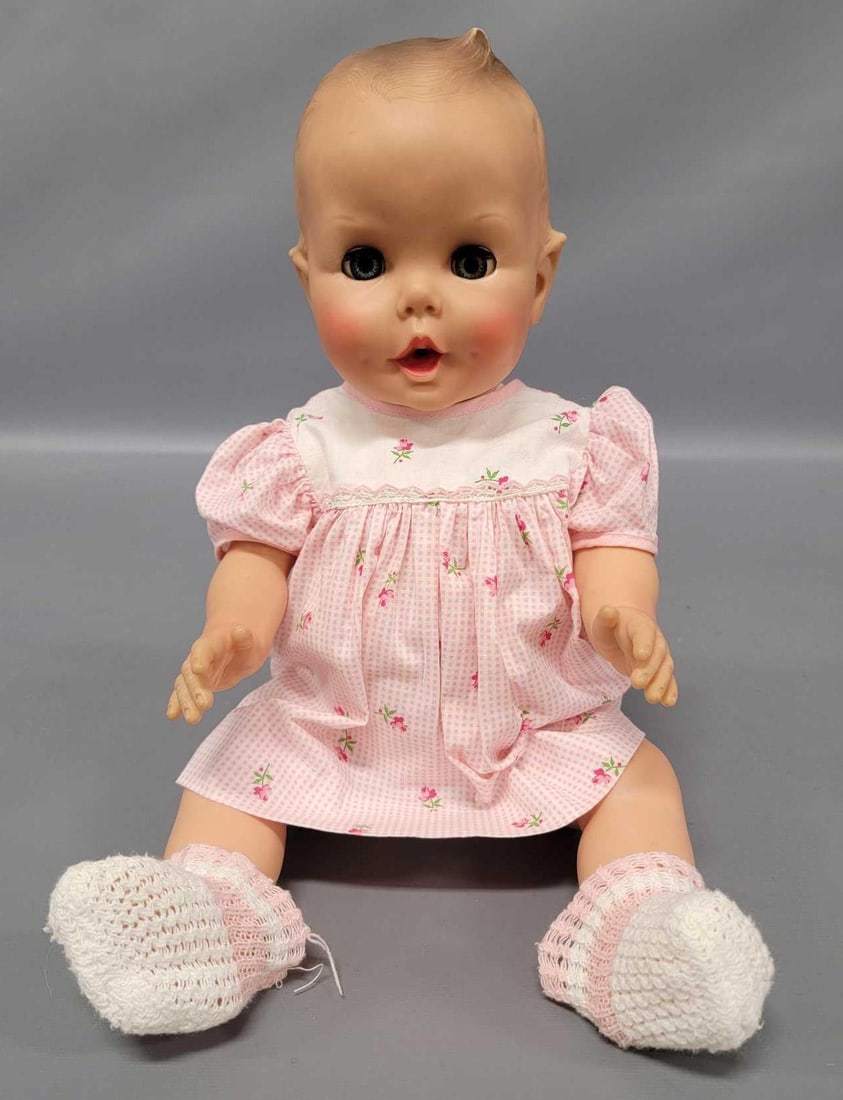 Vintage Gerber baby doll with sleepy eyes: Vintage Gerber baby doll with sleepy eyes is in excellent condition with tight working arm and leg joints. There is rattling and something loose in her head, her right sleepy eye sticks, and some disc