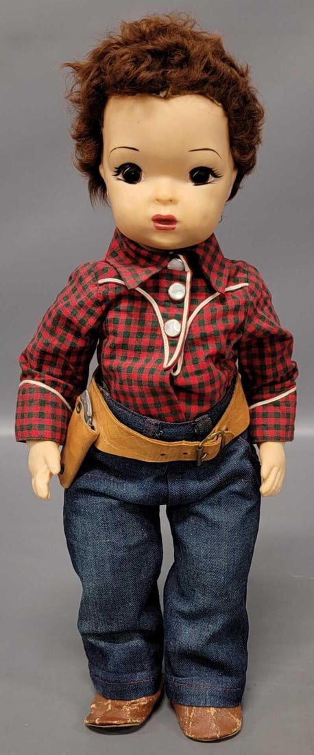 16 inch vintage Terri Lee doll: 16 inch vintage Terri Lee doll is in excellent condition and comes wearing cowboy outfit including boots, gun and holster, and tagged checkered shirt that is missing bottom half of middle snap as seen