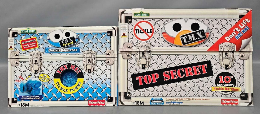 Vintage Fisher Price Sesame Street TMX Elmo and Cookie Monster in original boxes: Vintage Fisher Price Sesame Street TMX 10th anniversary Tickle Me Elmo is in excellent condition as well as the box he comes in. Cookie Monster is in excellent condition and it appears the original bo