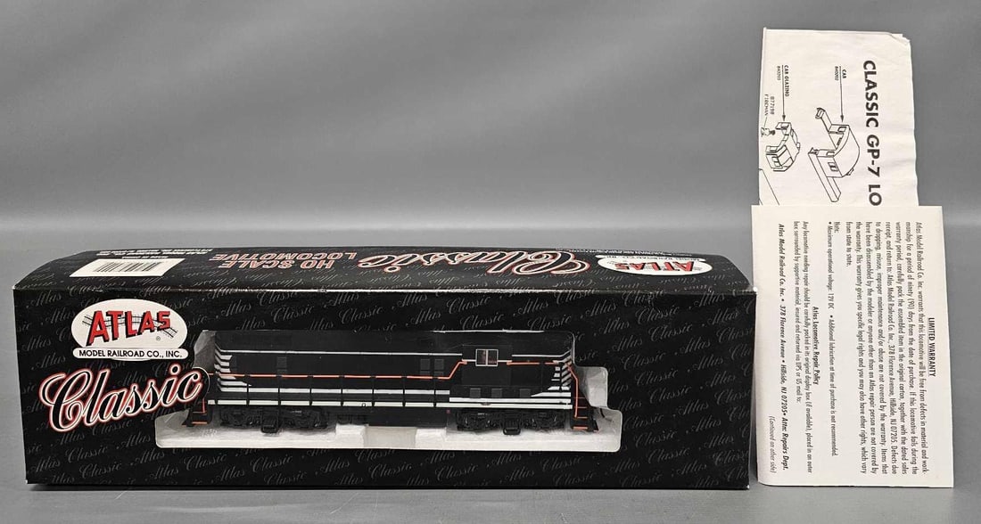 Atlas Classic EMD GP-7 Chicago & Eastern Illinois Locomotive: Atlas Classic EMD GP-7 Chicago and Eastern Illinois Locomotive stock number 8449 without road numbers, C9-10 in a very good to excellent original box as seen in the photos.