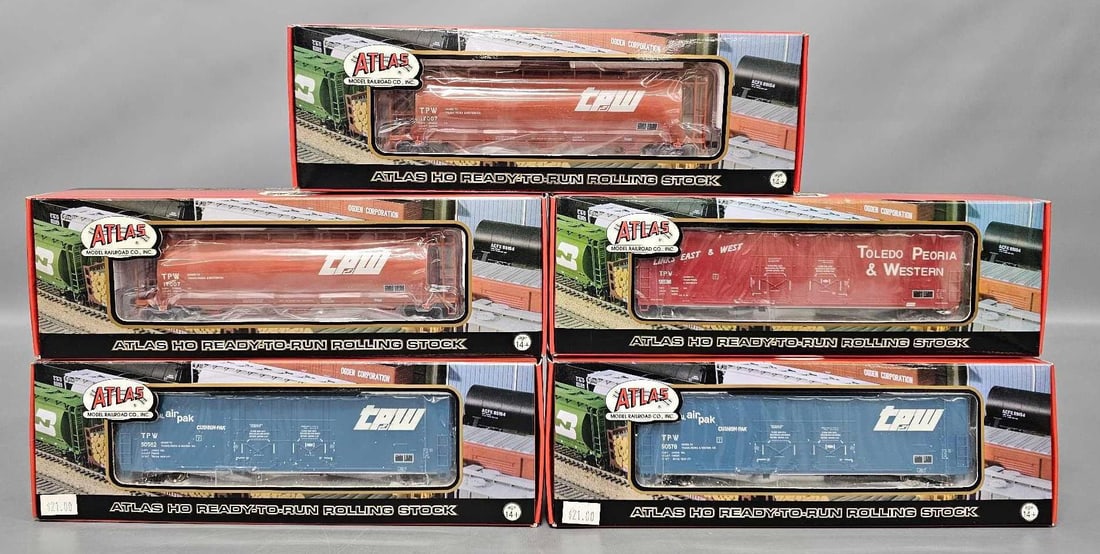 Five Atlas Toledo, Peoria & Western Cylindrical Hopper and DPD Box cars in original boxes: Five Atlas Toledo, Peoria and Western Cylindrical Hopper and double plug door Box cars. Consists of two ACF 3-Bay Cylindrical Hopper cars stock numbers 1985 road numbers 17007 and three 777 Evans doub