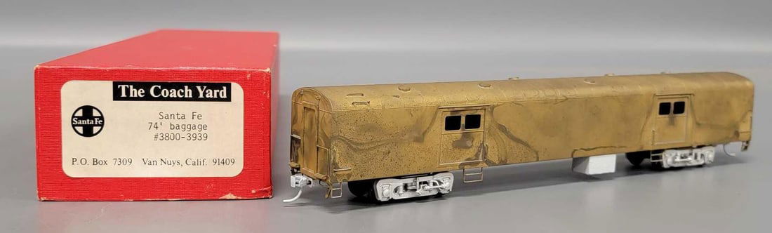 The Coach Yard HO brass Santa Fe 74' baggage car in original box: The Coach Yard HO brass Santa Fe 74 foot baggage car in original box, C5-6 due to tarnish and discoloration but never used in a near mint original box with original foam insert as seen in the photos.