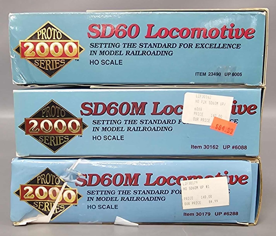 Three Life Like HO Proto 2000 SD60 Locomotives in original boxes (1 of 8)
