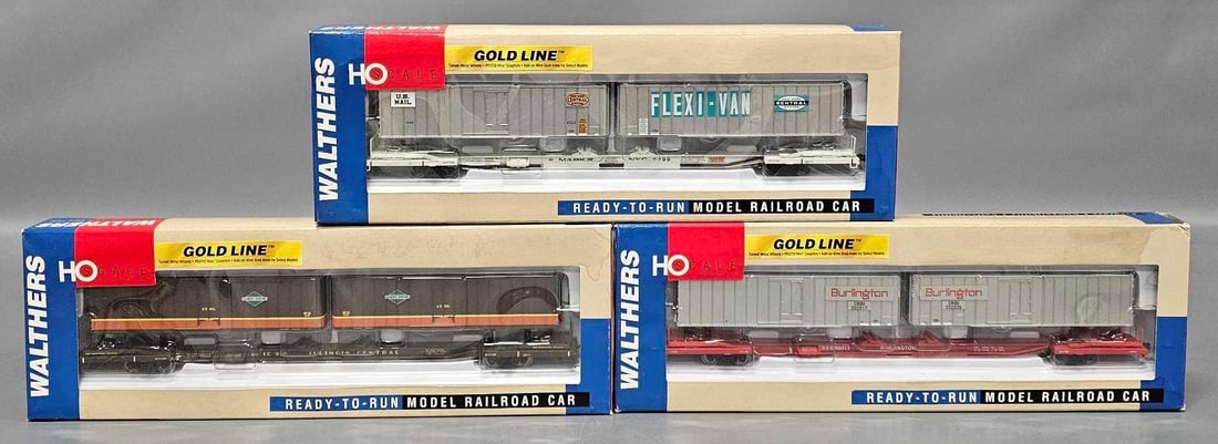 Three Walthers Gold Line Flexi-Van Mark IV Flat Cars with Trailers in original boxes: Three Walthers Gold Line Flexi-Van Mark IV Flat Cars with Trailers. Consists of New York Central stock number 932-41053 road number 9799, Illinois Central stock number 932-41055 road number 918 and Ch