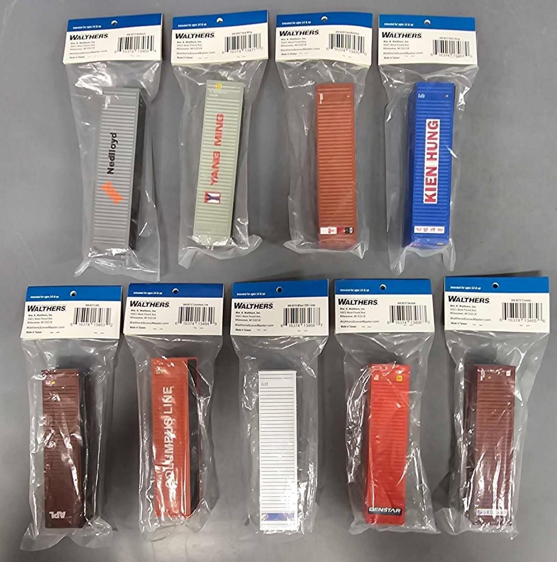 Nine Walthers Scene Master freight Containers in factory sealed bags: Seven Walthers Scene Master freight Containers. Consists of Crowley, MOL, Transamerica, Nedlloyd, Genstar, Columbus Line, APL, Yang Ming and Kein Hung containers in excellent condition as seen in the 