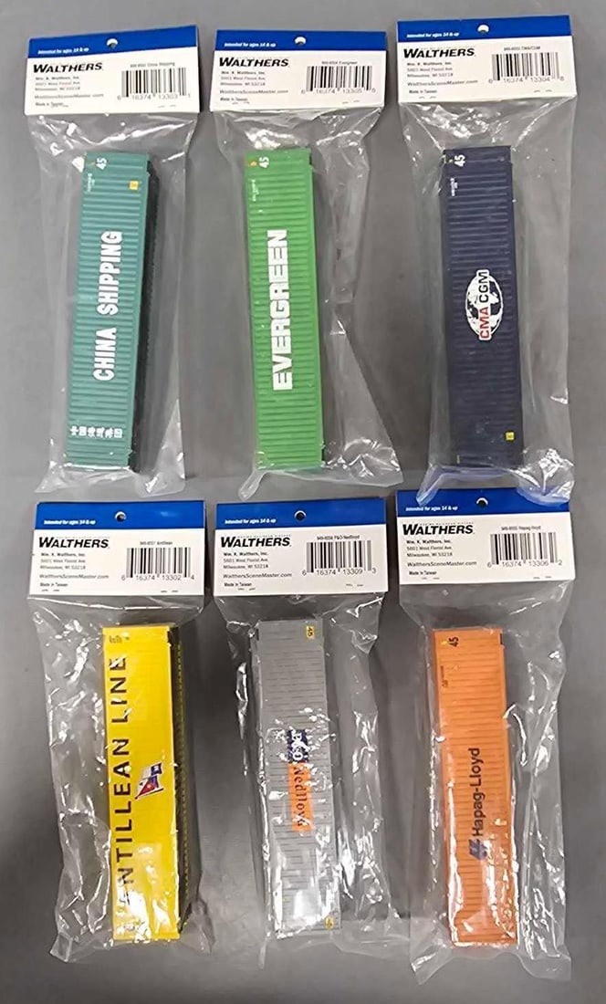 Six Walthers Scene Master freight Containers in factory sealed bags: Six Walthers Scene Master freight Containers. Consists of China Shipping, P and O Nedlloyd, Antillean Line, Hapag-Lloyd, CMA CGM and Evergreen containers in excellent condition as seen in the photos.