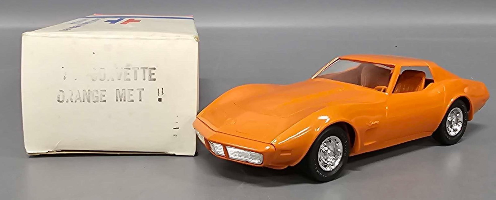 Mint 1974 Chevy Corvette dealer promo car in original box orange met: Mint 1974 Chevy Corvette dealer promo car in original box orange met, car is gorgeous and flawless, the original box is very good to excellent condition with brown spots as seen in the photos.