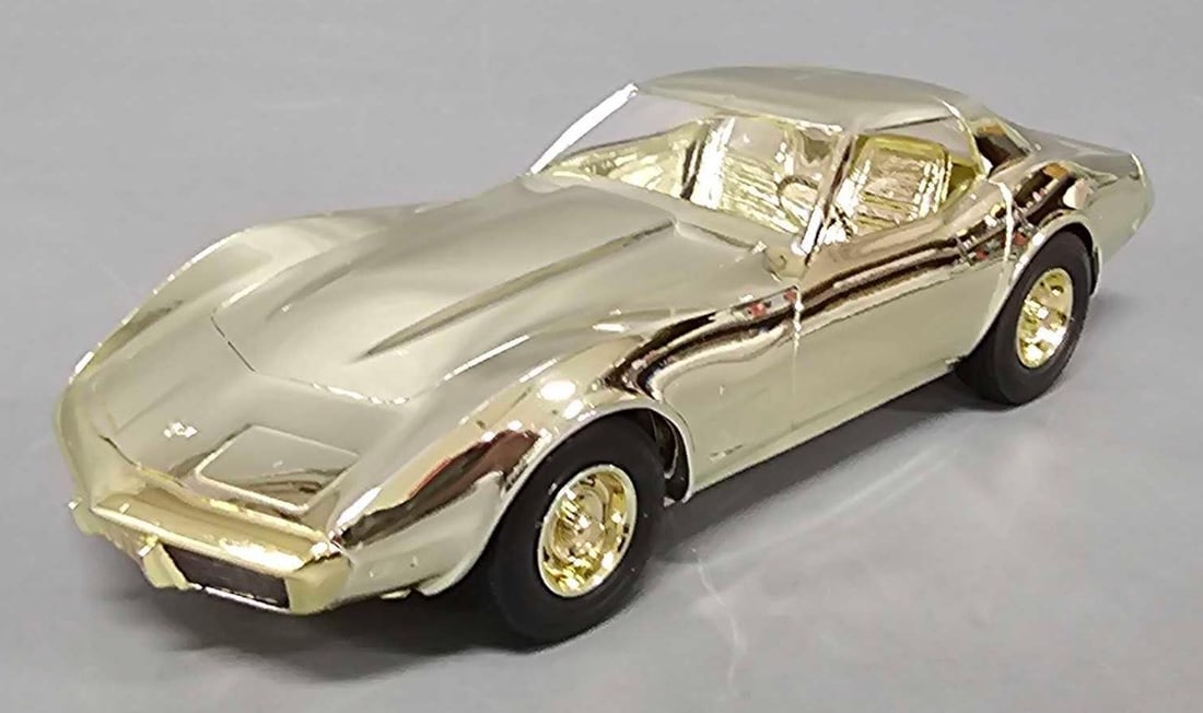 Rare GOLD chrome 1977 Chevy Corvette dealer promo car by Ron Pittman: Rare GOLD chrome 1977 Chevy Corvette dealer promo car. Ron Pittman had these cars plated and distributed them. I do not know ah them were made but I cannot find a single sold example of one.