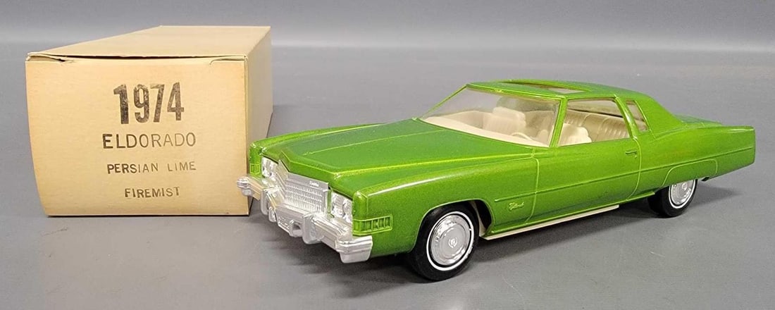 1974 Cadillac Eldorado dealer promo car in original box Persian lime firemist: 1974 Cadillac Eldorado dealer promo car in original box in Persian lime firemist. Car is missing the hood ornament but is otherwise near mint to mint in an excellent original box as seen in the photos