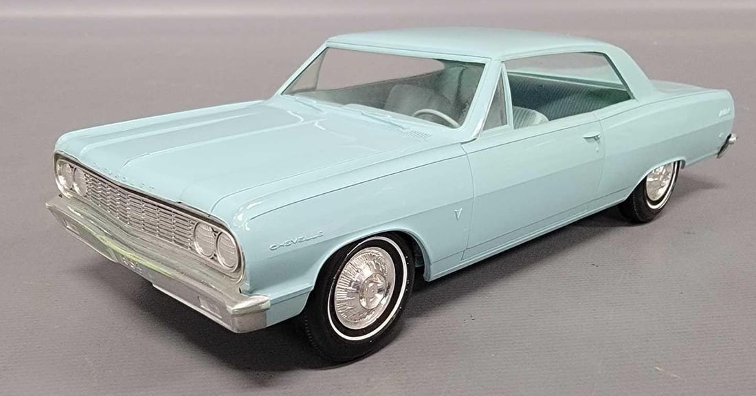 1964 Chevy Chevelle hardtop friction promo car in azure aqua poly: 1964 Chevy Chevelle hardtop friction promo car in azure aqua poly. Car is excellent to near mint and the friction motor still turns as seen in the photos.