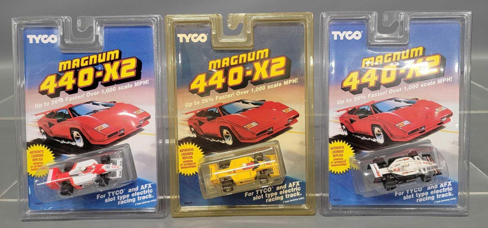 Three Tyco Magnum 440-X2 Indy HO slot cars on blister cards (1 of 7)