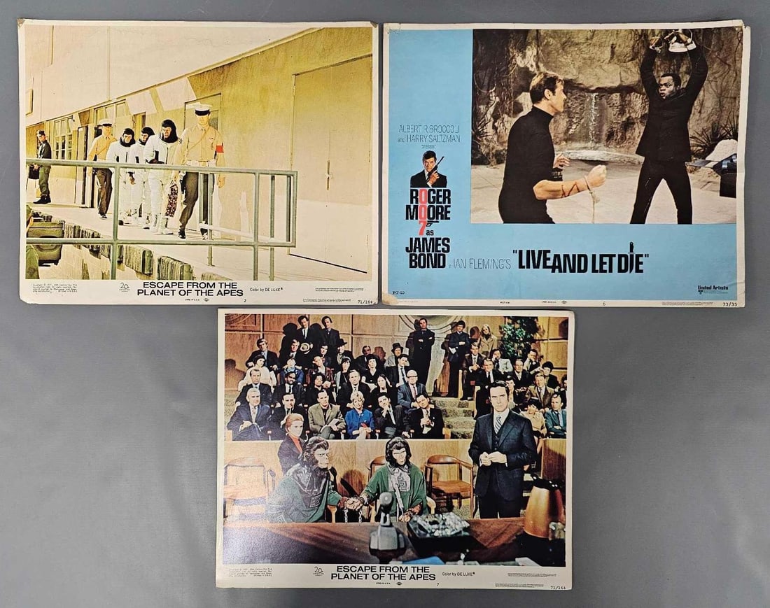 Three vintage lobby cards POTA and 007: Three vintage lobby cards to include Escape From the Planet of the Apes numbers 2 and 7 plus James Bond Live and Let Die number 6, all in fair to good condition as seen in the photos. These measure 14