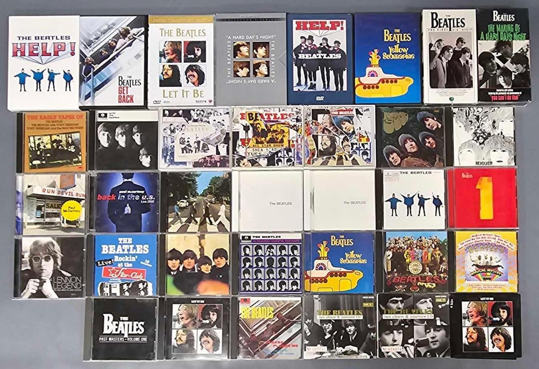 Large group of The Beatles CDs DVDs and two VHS (1 of 6)