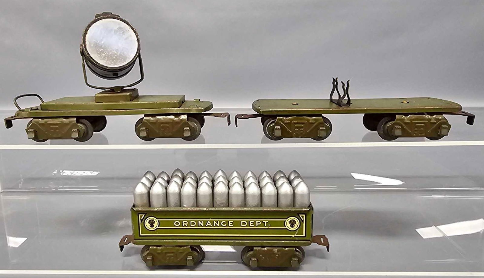 Three Marx O gauge six inch eight wheel Army train cars (1 of 6)