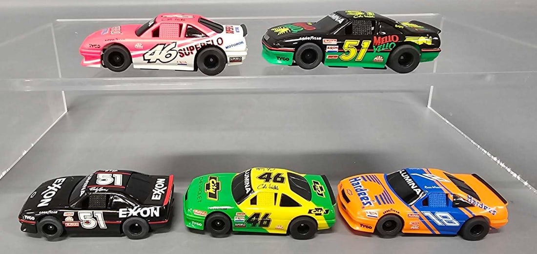 Tyco Magnum 440-X2 Days of Thunder 5 car set with LUMINA on windshields HO slot cars: Tyco Magnum 440-X2 HO slot car Days of Thunder 5 car set with LUMINA on windshields and air dams to include Russ Wheeler 18 Hardees; Cole Trickle 46 Superflo and 46 City Chevrolet; Rowdy Burns 51 Exxo