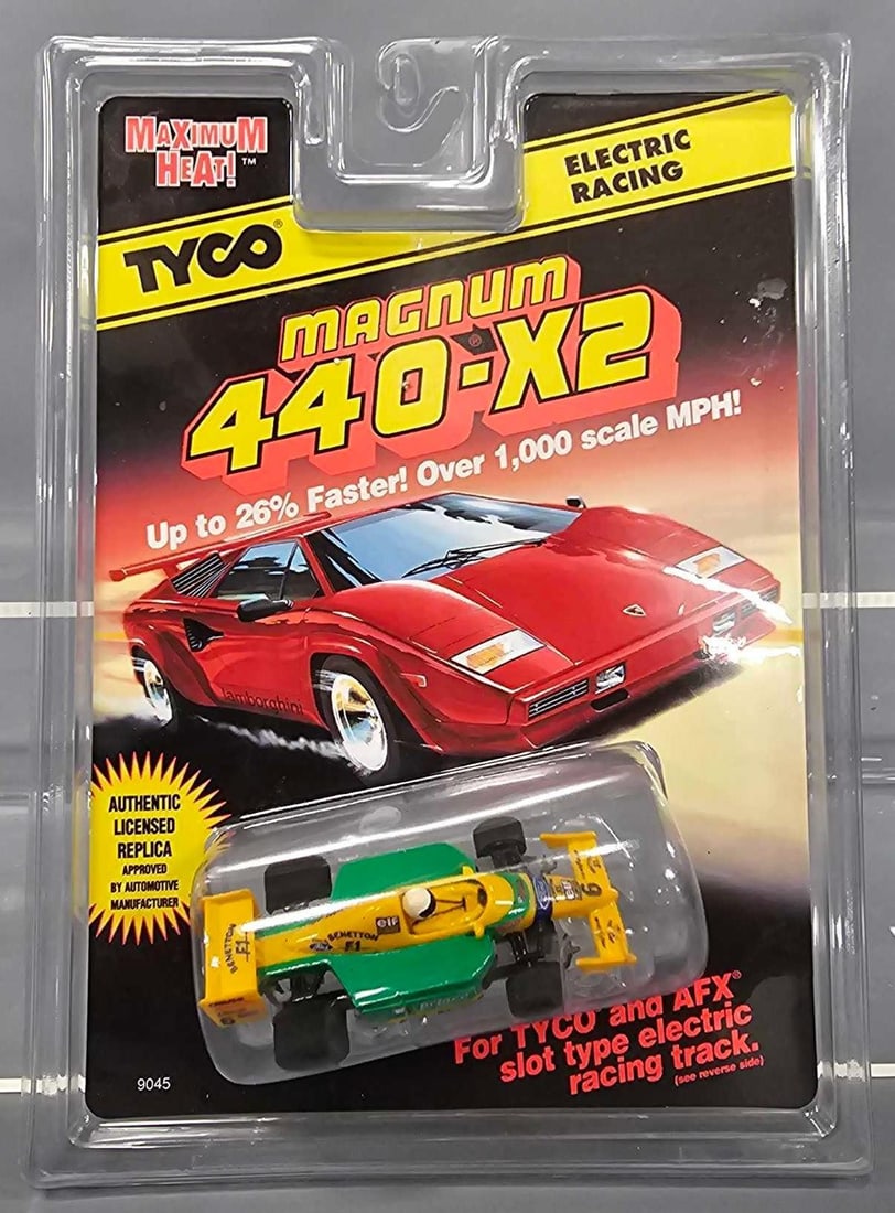 Tyco Maximum Heat Magnum 440-X2 Prince Elf Benetton HO slot car on blister card 9045: Tyco Maximum Heat Magnum 440-X2 Prince Elf Benetton HO slot car on blister card, stock number 9045. Car is mint on a near mint card as seen in the photos.