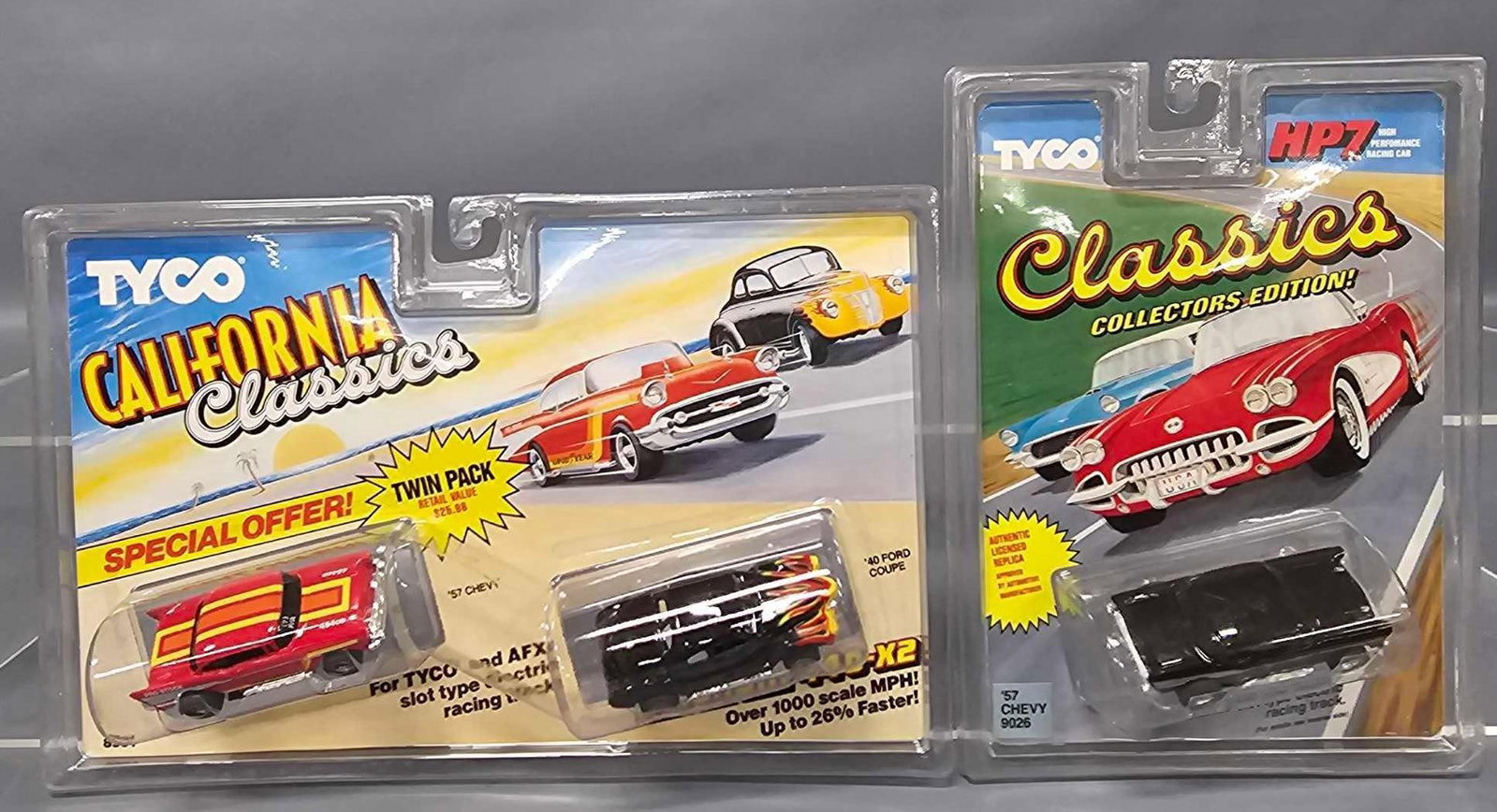 Three Tyco Classic HO slot cars on two different blister cards: Three Tyco Classic HO slot cars on two different blister cards to include 9026 HP7 black 57 Chevy and 8991 Magnum 440-X2 pro stock 57 Chevy and 40 Ford coupe, all three cars are mint on near mint card