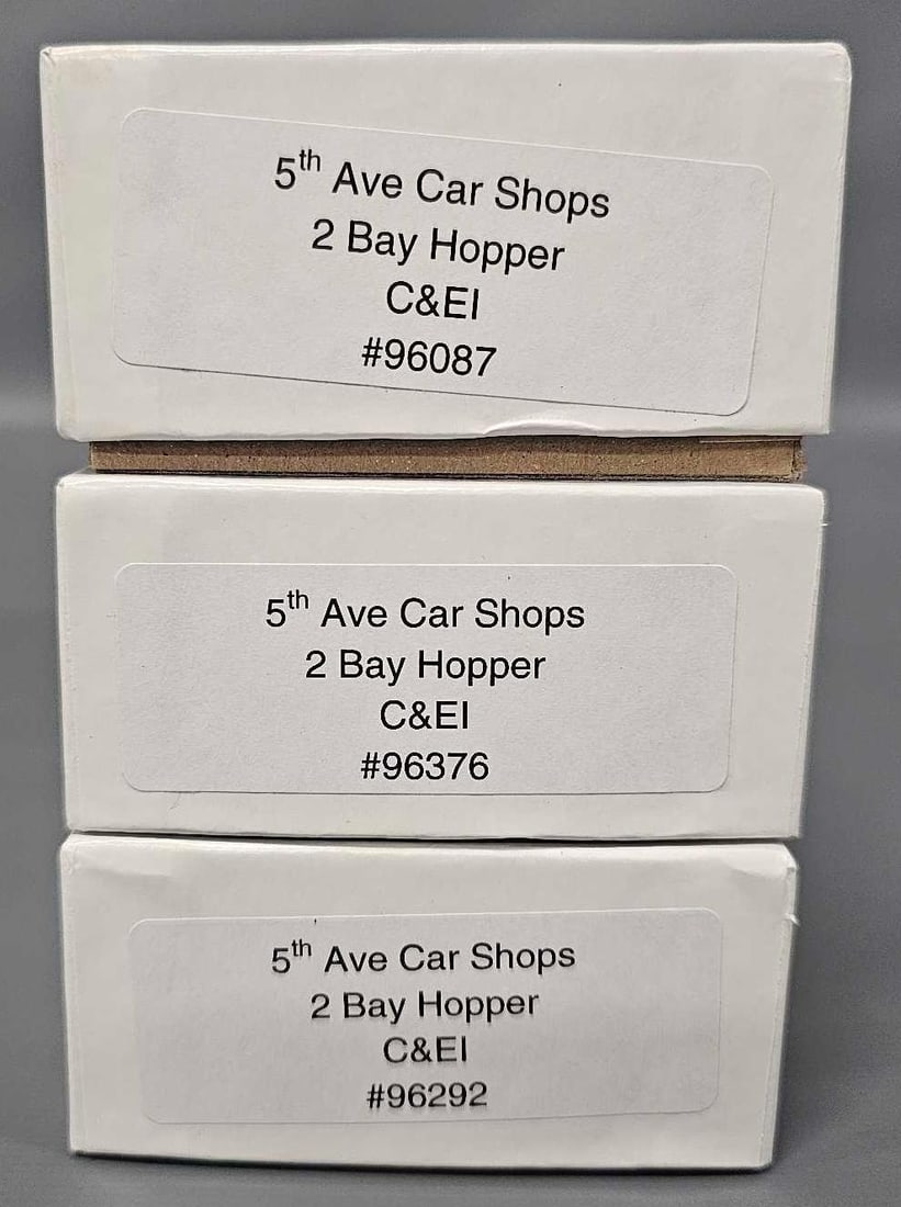 Three Accurail 5th Ave Car Shops HO Chicago and Eastern Illinois 2 bay hopper kits in original boxes: Three 5th Ave Car Shops Chicago and Eastern Illinois 2 bay hopper kits in original boxes to include road numbers 96087, 96292 and 96376, all three appear complete and untouched, these all come with tr