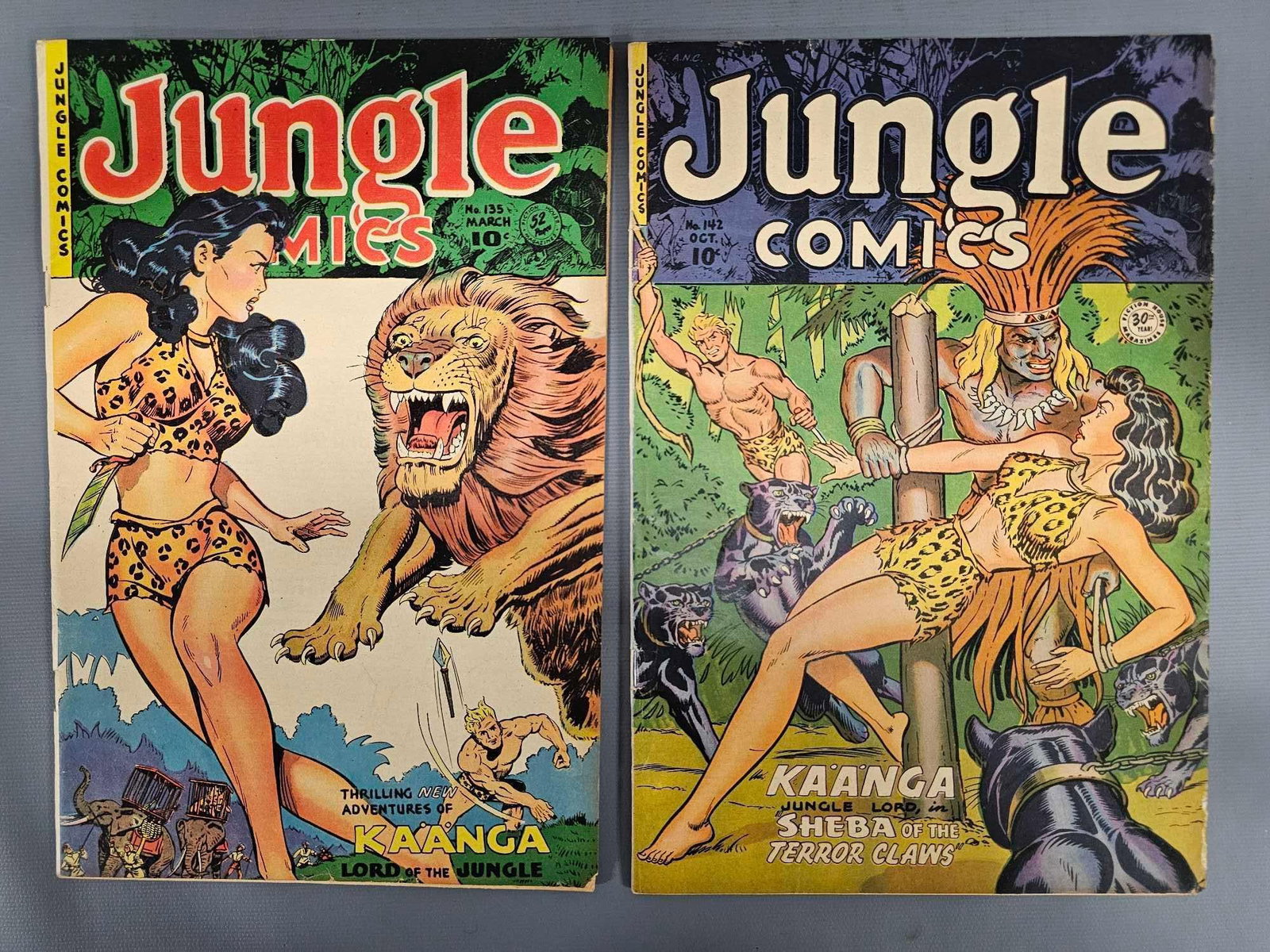 Jungle Comics 135 142: Jungle Comics 135 mid grade, top staple slightly loose, chipped bottom right. 142 mid grade edge chipping and tears as seen in the photos.