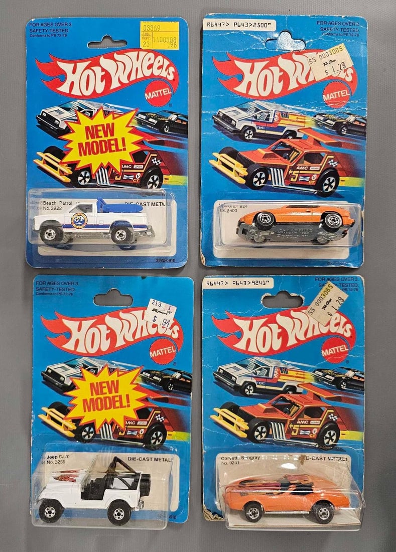 Four Blackwall Hot Wheels on blister cards: Four Blackwall Hot Wheels on blister cards to include stock numbers 3922 Beach Patrol, 3259 Jeep CJ-7, 2500 Upfront 924 and 9241 Corvette Stingray, all Hong Kong castings as far as can be seen. The ca
