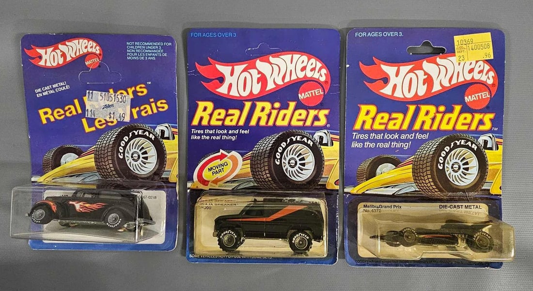 Three Mattel Hot Wheels Real Riders on blister cards: Three Mattel Hot Wheels Real Riders on blister cards to include stock numbers 4367 40s Ford / La Dingo 1940 on an unpunched international card plus 4372 Malibu Grand Prix and 4360 Baja Breaker. Cars a